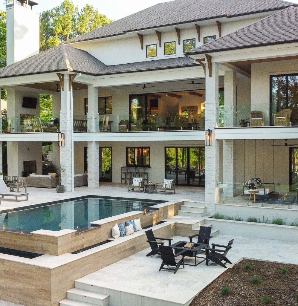 Double Decker Covered Porches Overlooking Resort Style Pool And Patio@2x Min