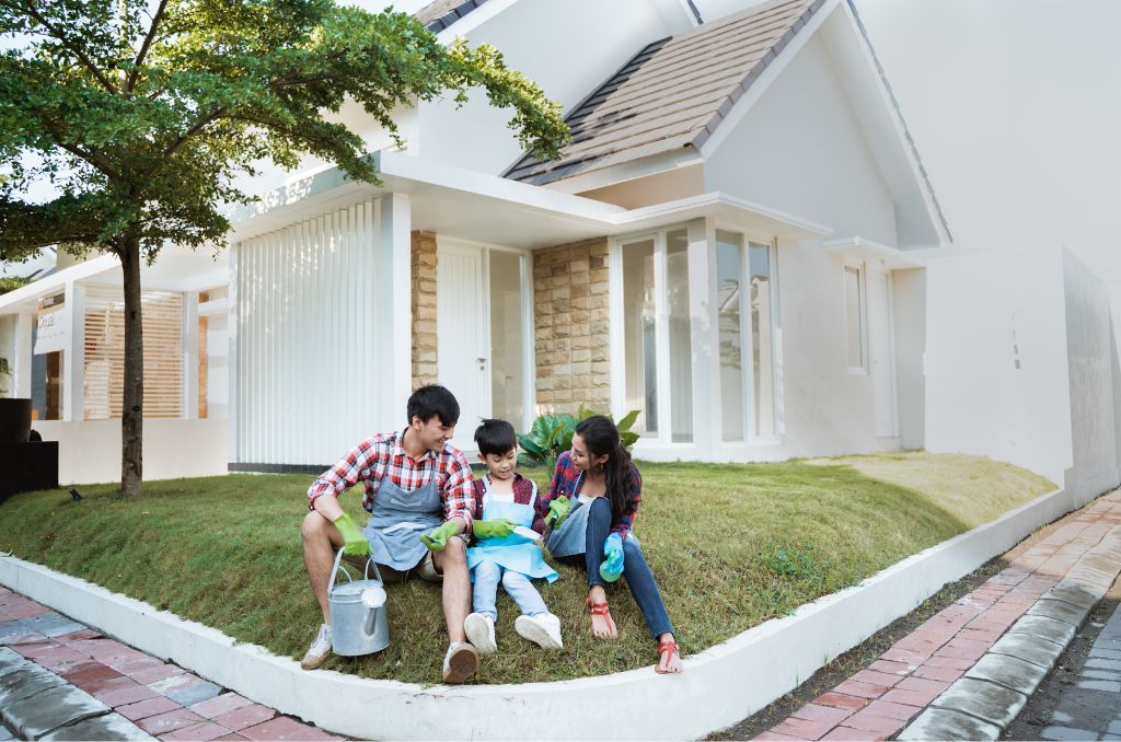Family sitting on lawn