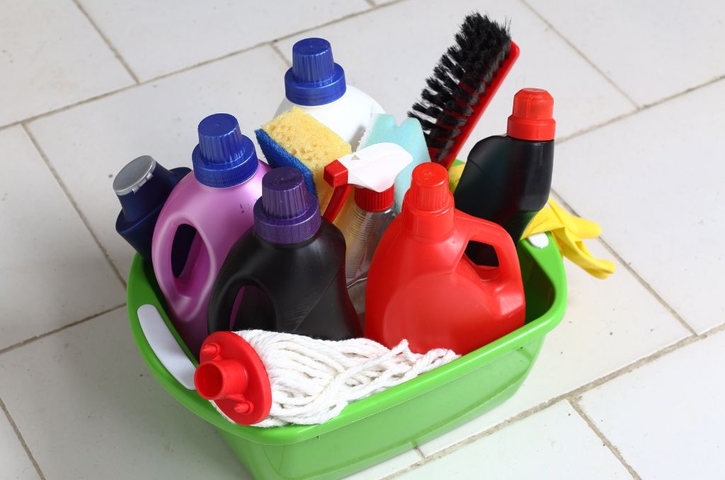 Plastic bin of household chemicals