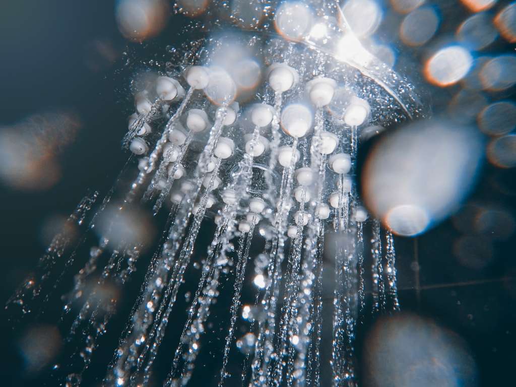 Water from high efficiency shower head