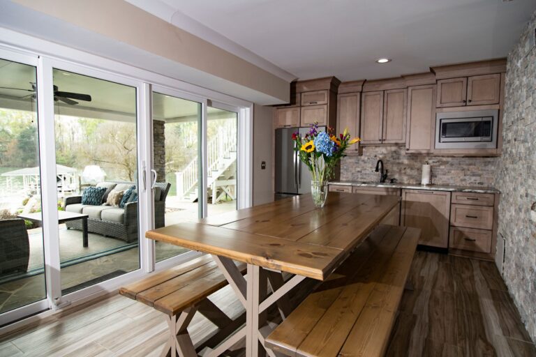 Modern Sunroom Dining Walkout Basement Patio