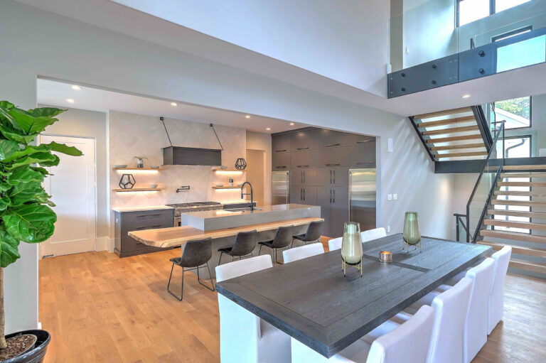 Open Floor Plan Dining Room Kitchen Island Glass Stairwell